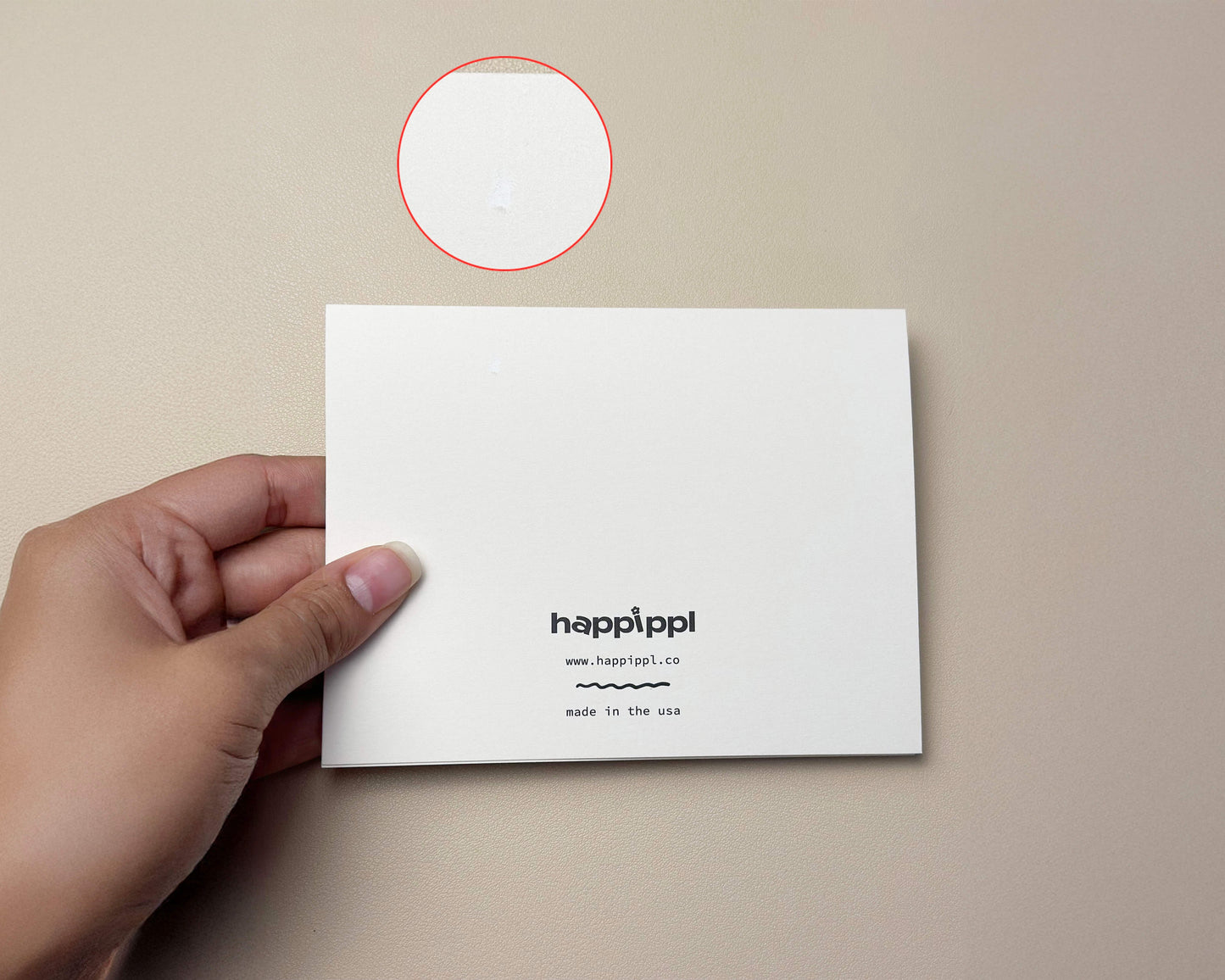 Back of the "Happy Holidays" card showing a small imperfection. The card is marked B-grade and includes the Happippl logo.